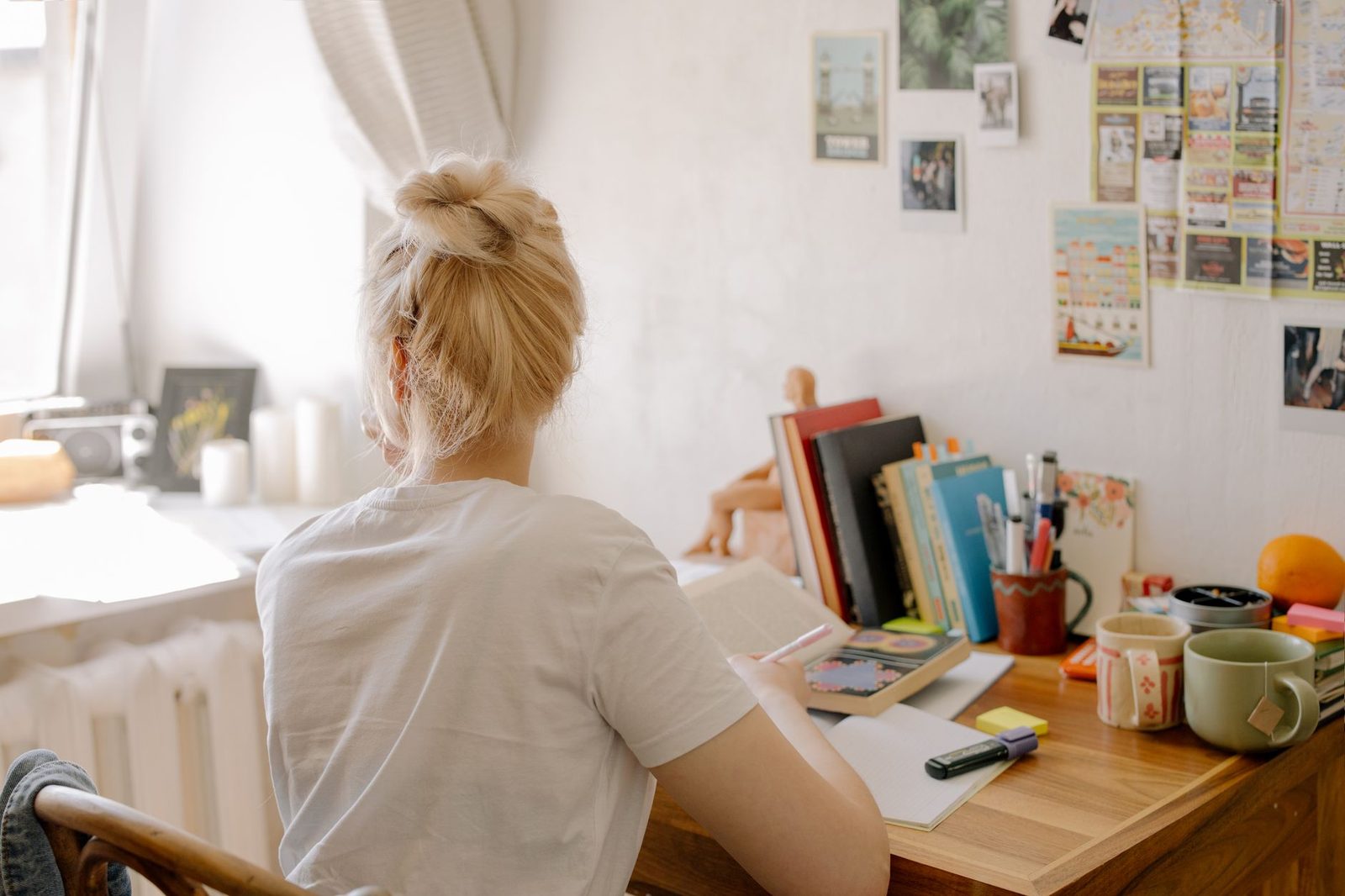 Student studying at a desk preparing for a standardized test