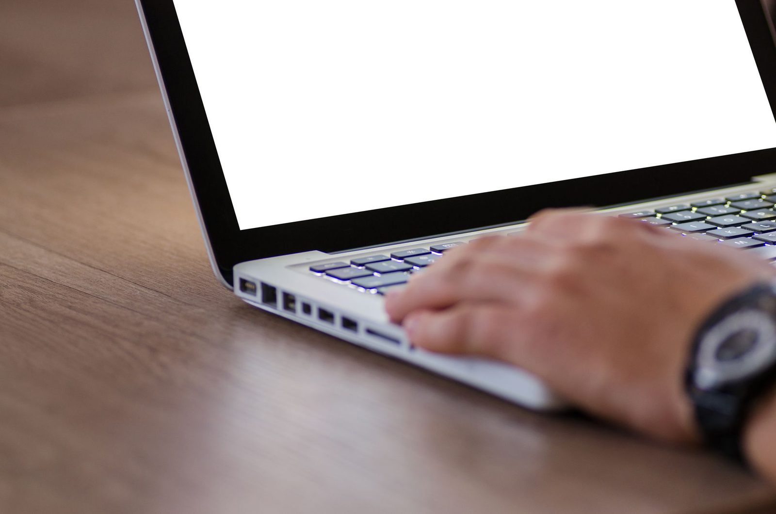 Student typing the opening lines of a personal statement on a laptop