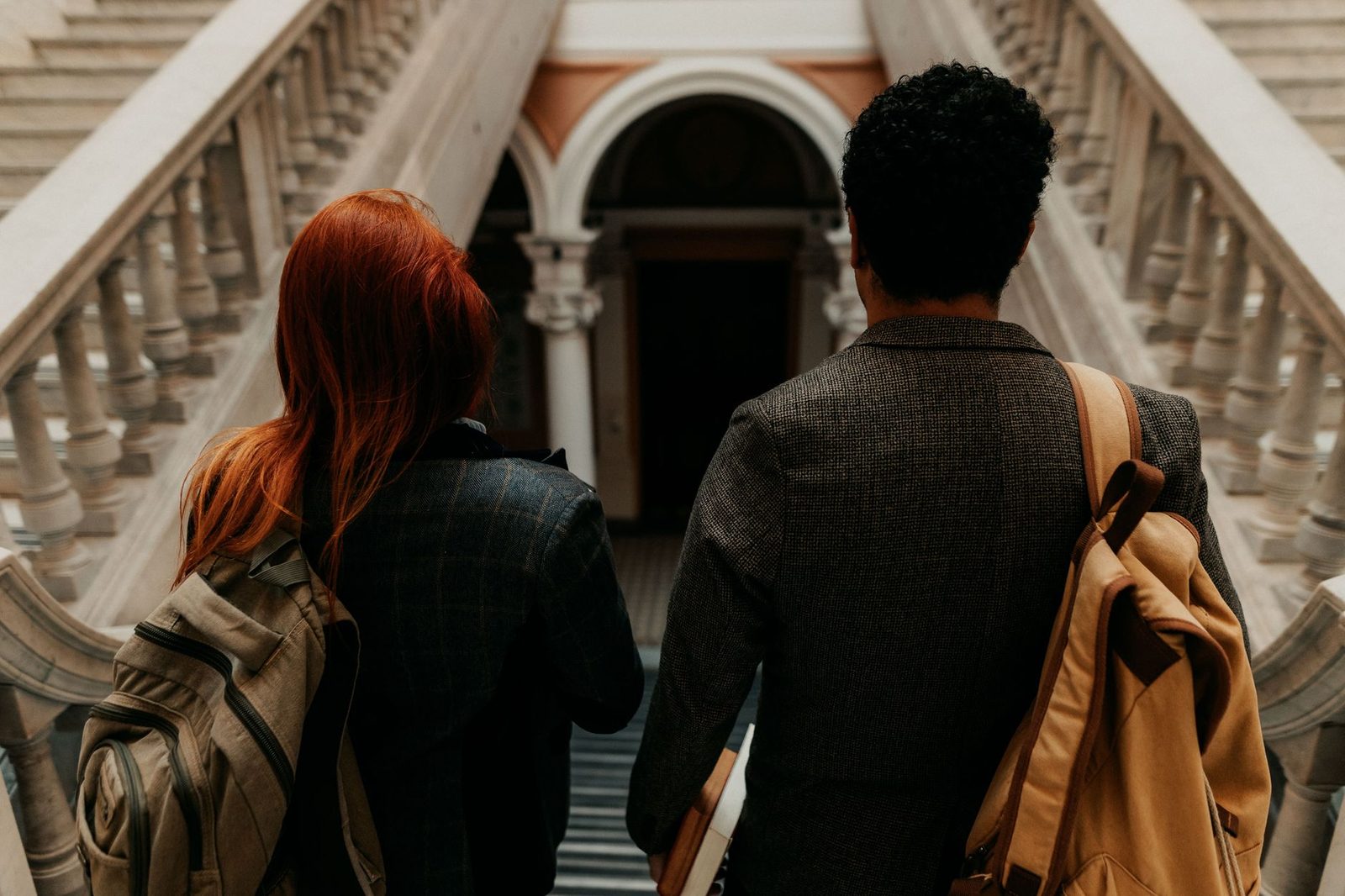 Students walking across a college campus