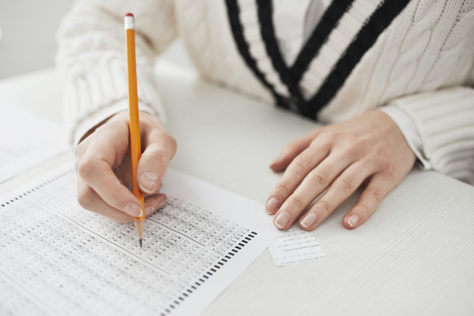 Student reviewing score report and taking notes