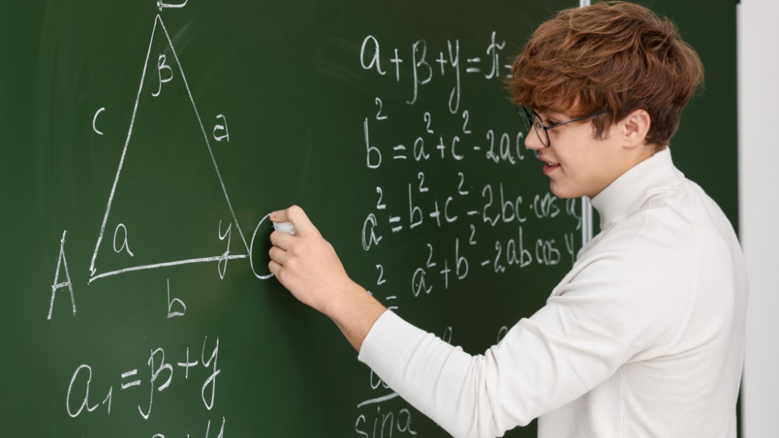 Student learning geometry formulas step by step, reflecting memorization strategies used to retain SAT formulas in 2026.
