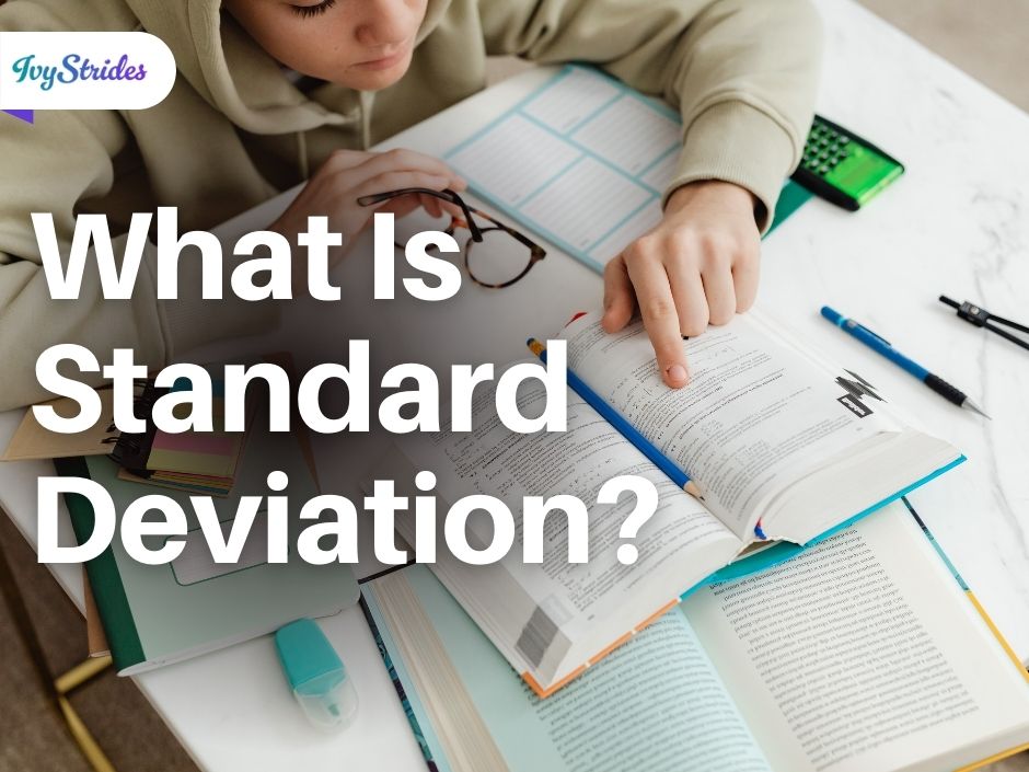 Person studying at a desk with books and supplies, pointing at a book. Text reads 'What Is Standard Deviation?' with IvyStrides logo.